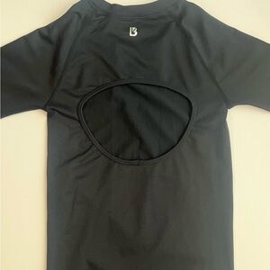 Buffbunny Long sleeve top with cut out on back